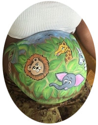 pregnant belly painting with jungle animals 